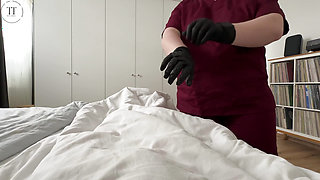 Hot nurse jerks off huge cock with rubber gloves