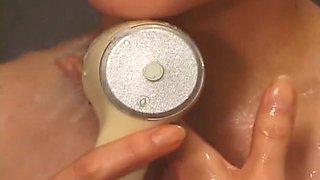 Japanese all natural nympho Mari Taichi stimulates her clit with water jet