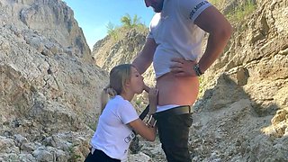 Blonde Babe Sucks a Big Cock Outdoors in a Canyon