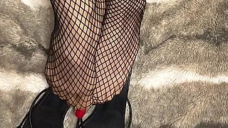 Fishnet in Open Toe Shoes with Red Nail Polish