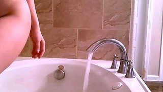 Amateur young brunette enjoys dildo on solo masturbation