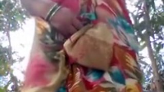 INDIAN AUNTY SHOWING BOOBS AND PUSSY IN THE JUNGLE