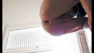 Fisting femdom with a huge dildo in her ass