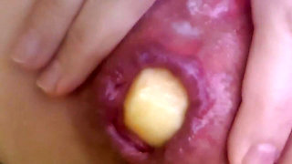 Anal insertion with a cute apple