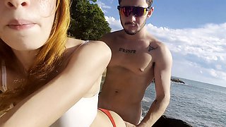 Steamy beach fun with a passionate couple enjoying some outdoor action