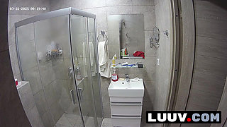 LUUV. A brunette showers, used to amateur cameras, showing her natural body
