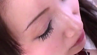 Japanese beauty sucks his cock and enjoys a vibrating wand