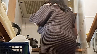 wife in the kitchen, sensually without panties cleaning