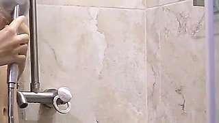 Skinny Teen Satisfies Herself in Shower