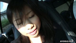 Asian chick Karin Asahi gives a blowjob in the car and gets wet