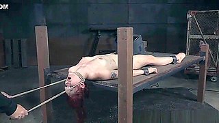 Suspended Redhead Clit Punished With Electro