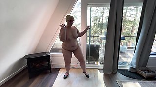 Stripping Whore Shows off Her Curves in Front of the Window Shaking Her as and Jiggling Her Boy She Instructs You to Cum