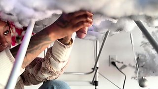 Pierced and tattooed boy sucking black cock from glory hole