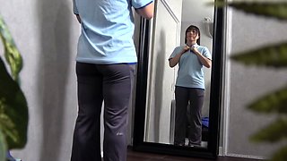 Cute amateur asian web cam girl playing with her toy