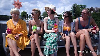 Eve Sweet and Delfine Dahlia Lead Naughty Amateurs in Outdoor Boat Party: Big Tits Bared