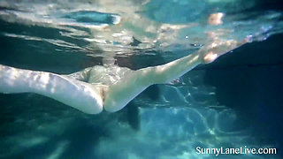Sunny Lane sucks cock underwater