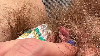 Amateur Hairy Girl Mastubates in Closeup with Huge Clit