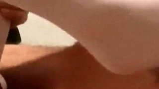 MILF in Pantyhose and Heels Gives a Footjob