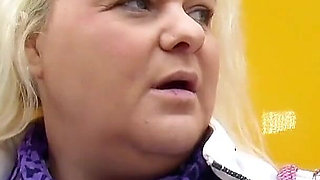 Fat German MILF with blonde hair masturbates her pussy