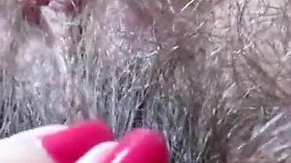 Hairy pussy is not an obstacle to clit play