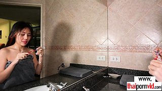 Restless Thai teen caressing her pussy