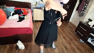 Brunette Cuts Clothes While Trying Them On