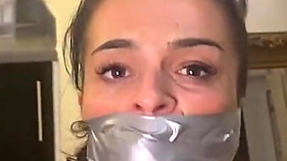 Latina Tied up and Gagged with a Tape Wrap (smaller Size)