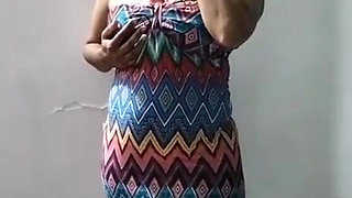 Hot desi bhabhi undressing herself