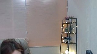 Korean camgirl tease in bright bikini