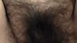 MILF admiring her fat, hairy pussy