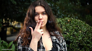 Sweet and Busty Russian Babe Smoking Cigarette in Nature