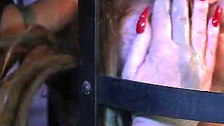 The Wild Maid Fina Is Kept in a Cage and Slimes Out of Her Mouth as She Greedily Eats Food From the Countess's Hand