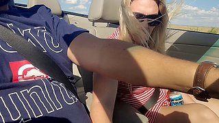 Truck driver enjoys the stunning view of a hot ash-blonde babe squirting in a convertible BMW