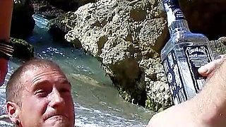 Horny teen and her girlfriend are banged by stepdad on the beach on vacation