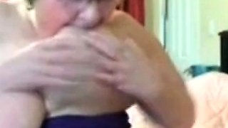 Big-Titted Granny Pleasures Herself with a Sex Toy on Webcam