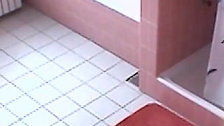 Amateur blonde masturbates on toilet