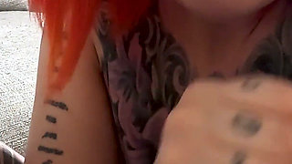 Tattooed Redhead Footjob Fun