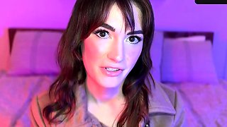 A brown haired girl in dark-hued with teasing