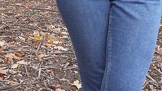 MILF Teasing Her Big Cameltoe in Blue Jeans Outdoors