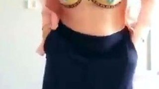 Turkish Arab in Hijab and Turban Performs a Striptease