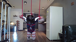 Mz31 - a Girl Tied and Suspended by a Red Rope Reaches Orgasm.