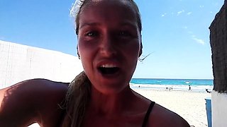 Outdoor solo masturbation scene with curly blonde